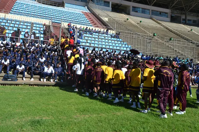 School teams lined up on the track